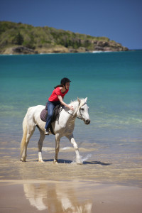 Tiphaine Perrier with her horse on Plage de Clugny.